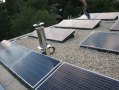 Fotovoltaika složená s fotovoltaických panelů uložených do plastových van, Středočeský kraj