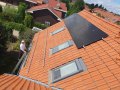 Solární panely Suntech ukládané do hliníkových profilů, Středočeský kraj